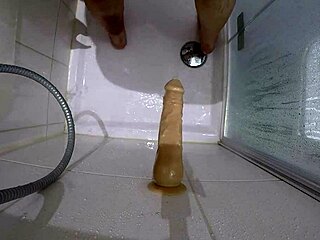 Gay Slave Endures Rough Dildo Fucking in the Shower