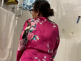 Mature Latina teases in a robe and reveals her big reveal