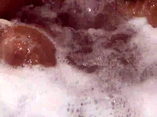 she moves her ass in the jacuzzi inviting daddy to join