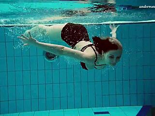 Dashka Stuns with Big Tits in Tight Pool Bikini