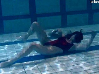 Ivetta plays seductively in pool, drawing all eyes