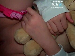 Pretty Asian teen with big tits bent over in doggystyle