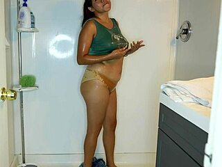 Latina wets jeans, strips panties, and showers off