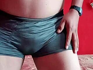 The model dances seductively in blue marine lace panties