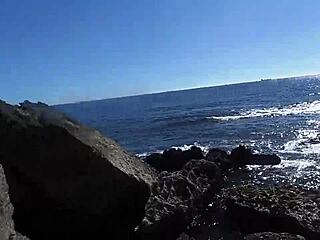 African Woman Relaxes On Nudist Beach