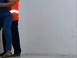 Cleaner Seduces Nurse in Office Hallway