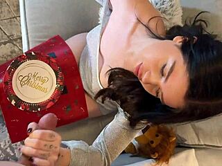 super hot brunette babe plays with dick and makes it cum as christmas present