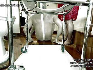 Can You Handle Watching This Ebony Mistress Dominate Her Bound Slave with Enema Punishment?