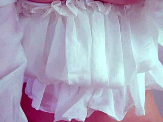 an older asian woman explores her hairy pussy with hands rubbing before deciding on insertion to hold back cum