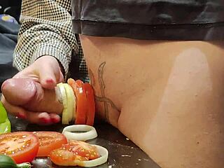 I'm tormenting this huge cock with extreme urethral insertion using cucumber on the kitchen desk. Domination and humiliation get wild in this homemade fetish roleplay.