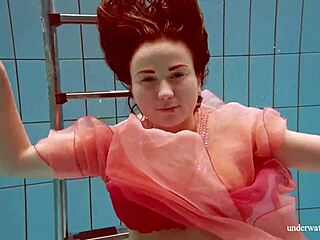 Deniska strips shaved teen body underwater