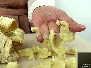 check out this japanese girl crushing banana handjob style super fetish fun